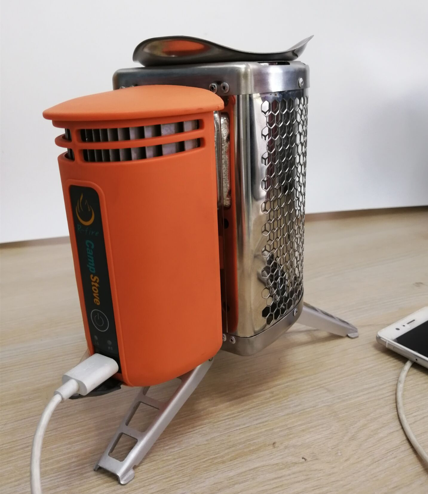 Camp stove that could be carried by yourself also could charge your phone